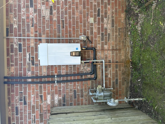 Leaking Gas Water Heater Replaced by Tankless Water Heater